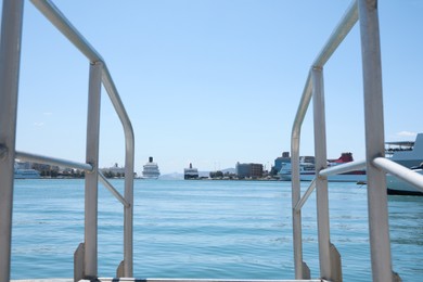Modern ship gangway in sea port on sunny day
