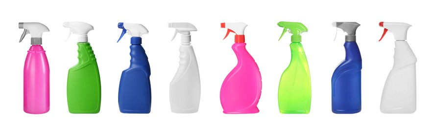 Set with bottles of different cleaning products on white background, banner design. Household chemicals