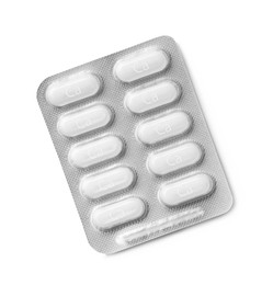 Calcium supplement pills in blister pack on white background, top view