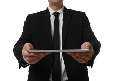 Businessman holding tablet computer on white background, closeup
