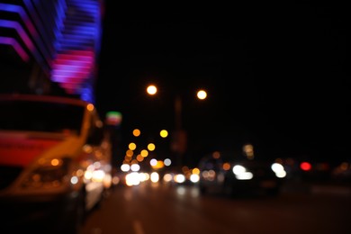 Blurred view of cityscape with bokeh effect. Night life