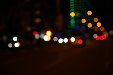 Blurred view of cityscape with bokeh effect. Night life