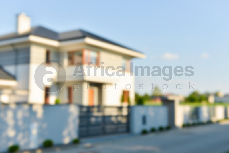 Blurred view of modern house on sunny day