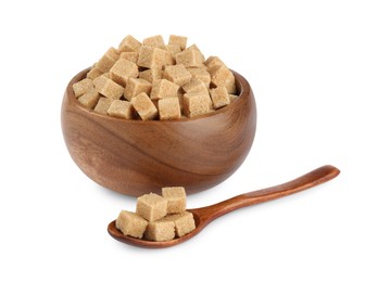 Wooden bowl and spoon with brown sugar cubes on white background