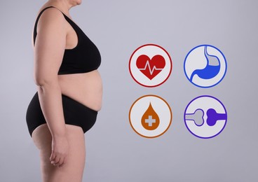 Image of Virtual icons demonstrating different health problems and overweight woman on grey background, closeup