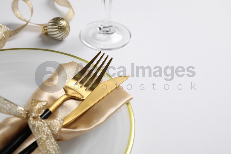 Beautiful Christmas table setting on white background, closeup