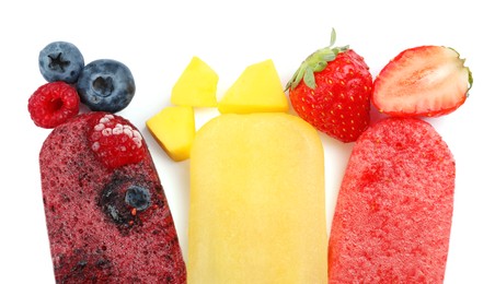 Photo of Different tasty ice pops isolated on white, top view. Fruit popsicle