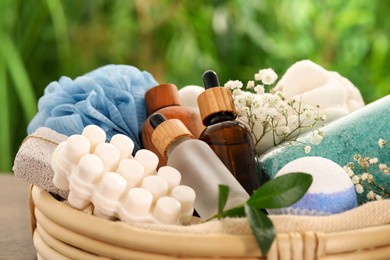 Photo of Spa gift set with different products on blurred background, closeup