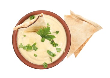 Photo of Delicious hummus with pita chips and parsley on white background, top view
