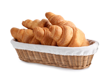 Photo of Tasty croissants in wicker bowl isolated on white