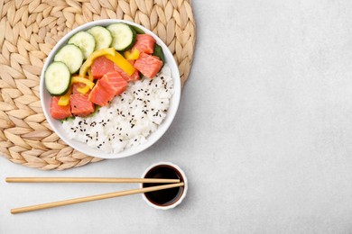 Photo of Delicious poke bowl with salmon, rice and vegetables on white table, flat lay. Space for text