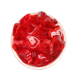 Tasty heart shaped jelly candies on white background, top view