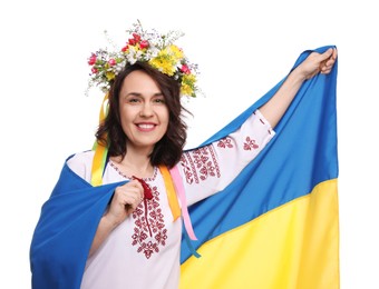 Happy woman in national clothes with flag of Ukraine on white background