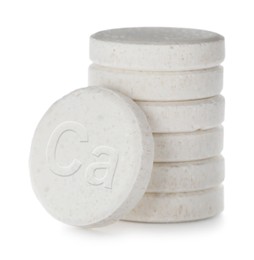 Calcium supplement. Stack of tablets on white background, closeup