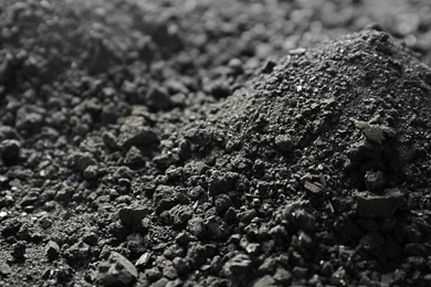 Black coal as background, closeup. Mineral deposits