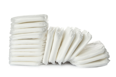 Pile of baby diapers isolated on white