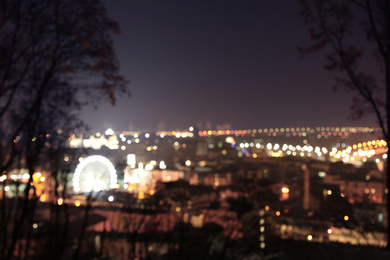 Panoramic view of modern night city. Bokeh effect