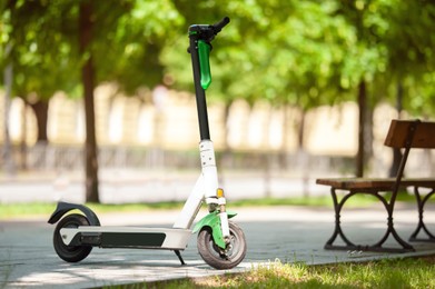 Modern electric scooter in park. Rental service