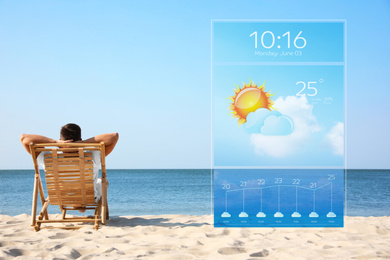 Young man relaxing in deck chair on sandy beach and weather forecast widget. Mobile application
