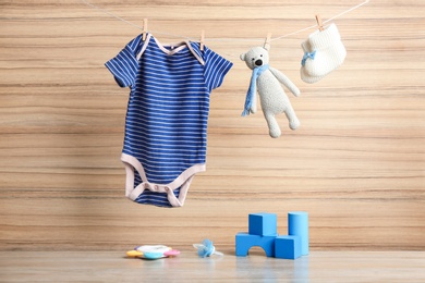 Composition with baby accessories on wooden background