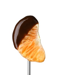 Segment of mandarin with chocolate on fondue fork against white background