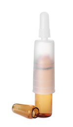 Open glass pharmaceutical ampoule with dropper on white background