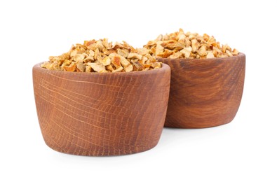 Photo of Bowls with dried orange zest seasoning isolated on white