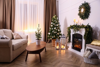 Beautiful room interior with fireplace and Christmas decor