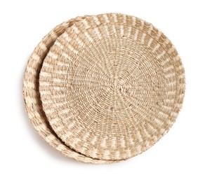 Wicker wall decor elements on white background, top view