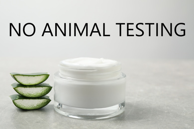 Jar of cream, aloe and text NO ANIMAL TESTING on light background