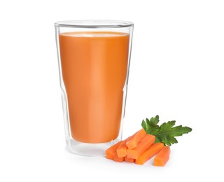 Photo of Glass of carrot juice and cut vegetable on white background