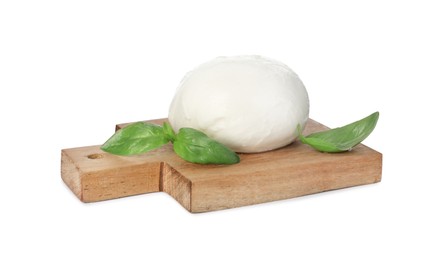 Wooden board with delicious mozzarella cheese ball and basil on white background