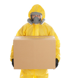 Man wearing chemical protective suit with cardboard box on white background. Prevention of virus spread
