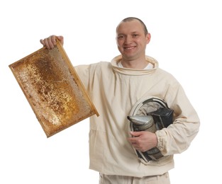 Beekeeper in uniform holding smokepot and hive frame with honeycomb on white background