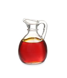 Palm oil in glass jug isolated on white