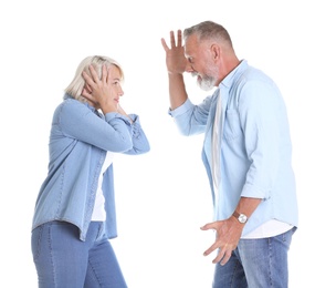 Mature couple having argument on white background. Relationship problems