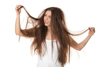 Photo of Emotional woman with tangled hair on white background