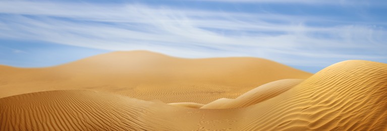 Picturesque view of sandy desert and blue sky on hot sunny day. Banner design