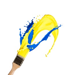 Brush with splashing yellow and blue paints on white background