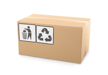Photo of Cardboard box with shipping label isolated on white