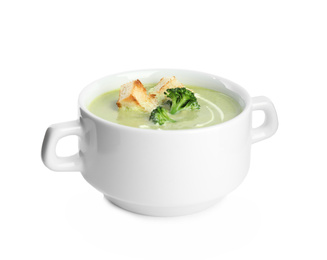 Delicious broccoli cream soup with croutons isolated on white