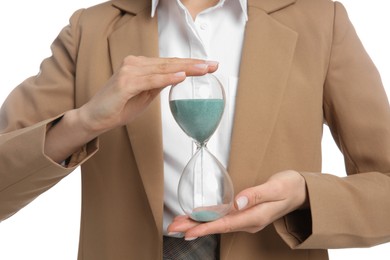 Businesswoman holding hourglass on white background, closeup. Time management