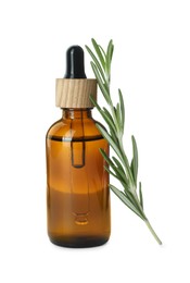 Bottle of essential oil and fresh rosemary isolated on white