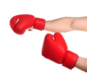 Man in boxing gloves on white background, closeup