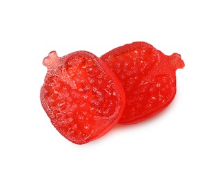 Delicious gummy pomegranate candies on white background
