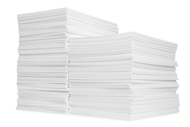 Stacks of paper sheets isolated on white