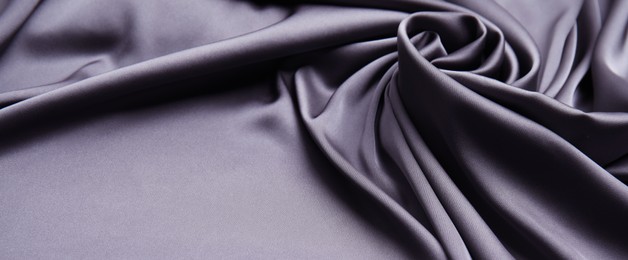 Silk fabric as background, closeup. Banner design