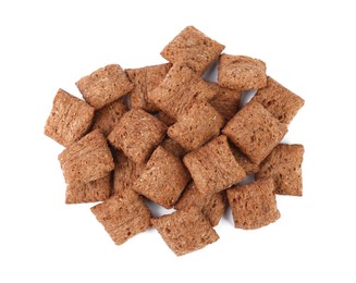 Heap of sweet crispy corn pads on white background, top view. Breakfast cereal