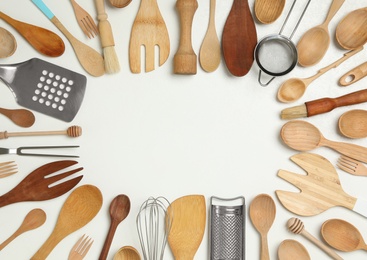 Frame of cooking utensils on white background, flat lay. Space for text