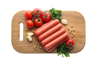 Fresh raw vegetarian sausages, tomatoes, garlic, parsley and soybeans on white background, top view